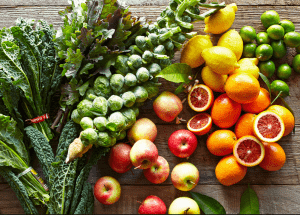 a group of fruits and vegetables on a wood surface Healthy Weight Loss Diets Bexleyhill